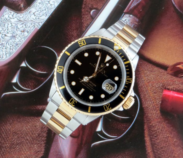 Black kit Rolex Submariner in steel & 18ct gold
